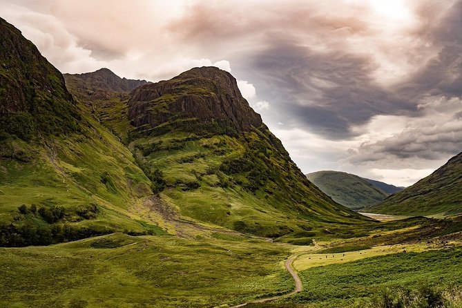 Loch in the Scottish Highlands with historic castle ruins